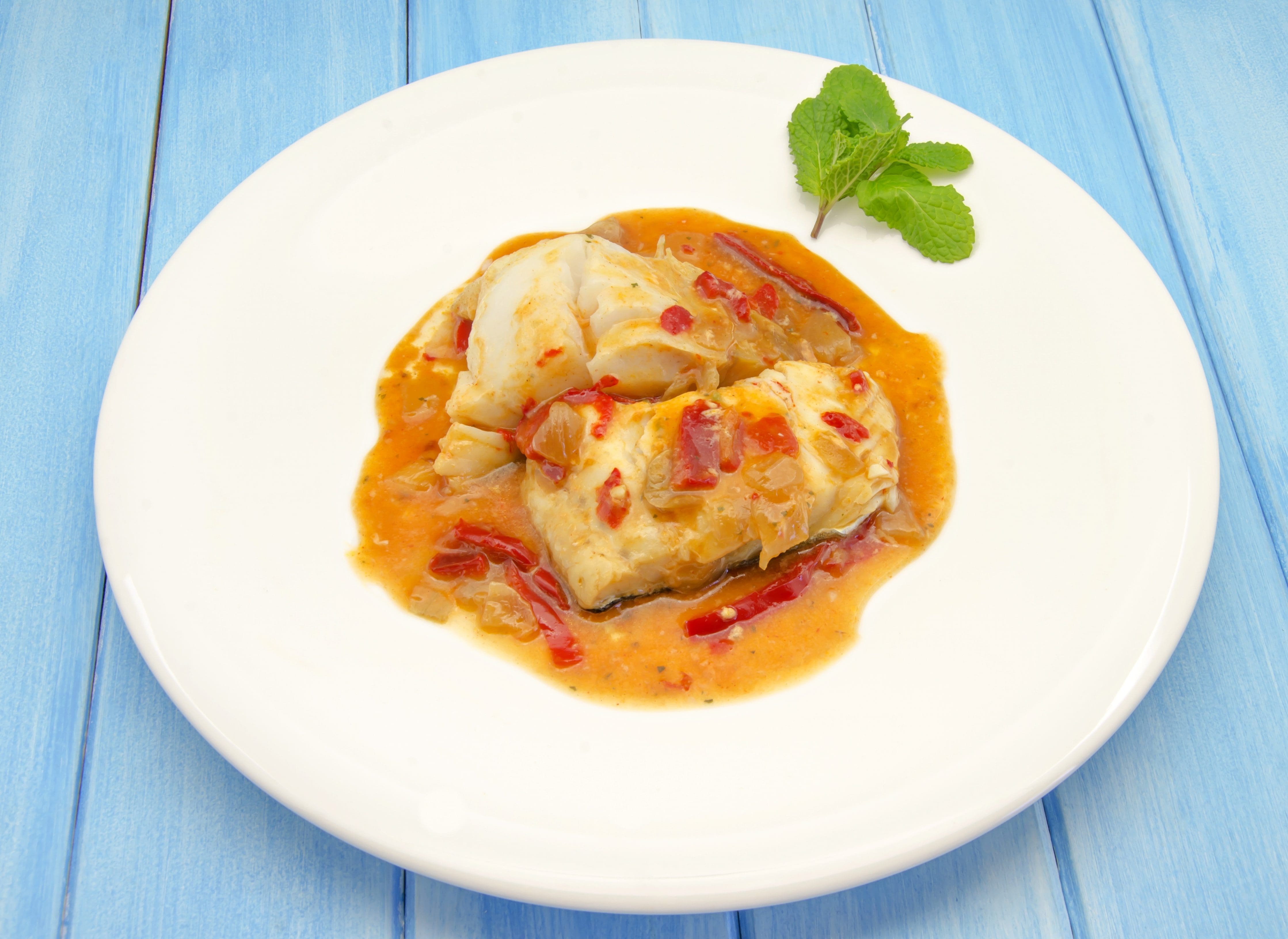 BAKED HALIBUT with ONIONS & TOMATO